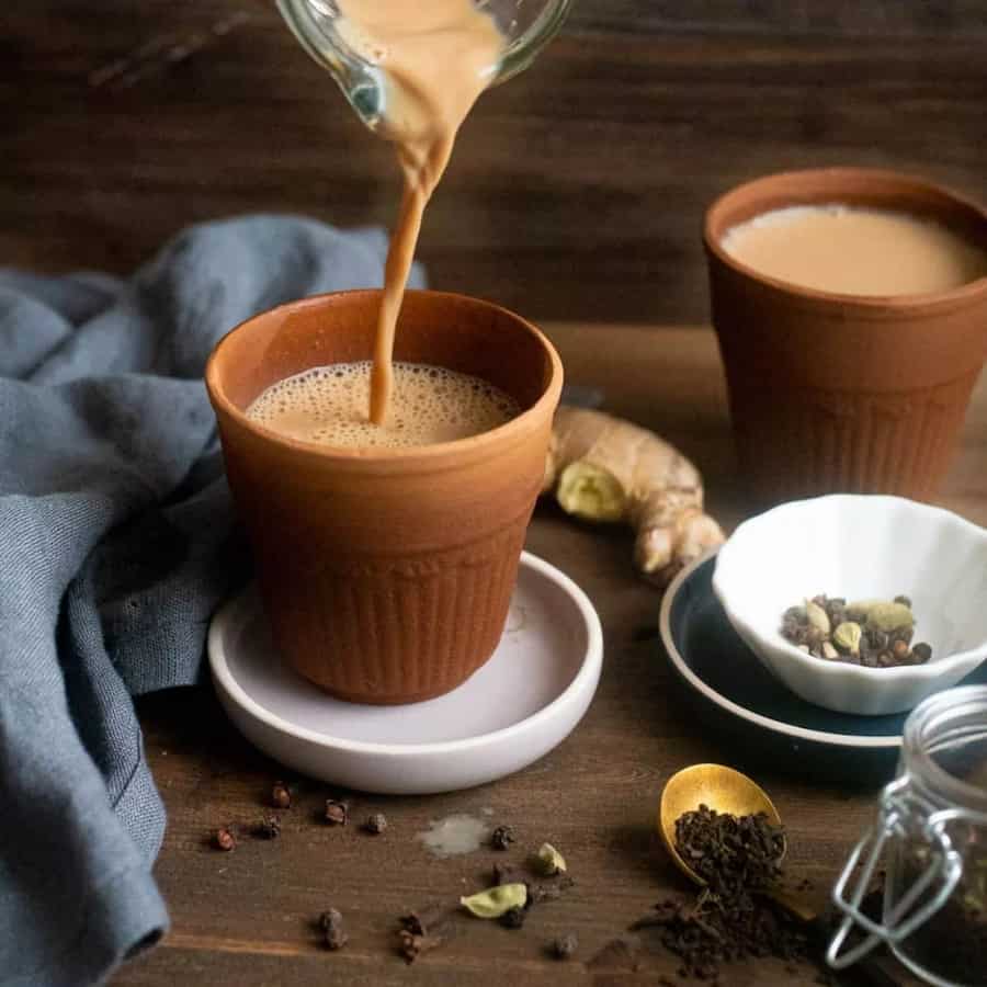 Bangladeshi doodh cha (milk tea) served in a traditional clay cup with spices