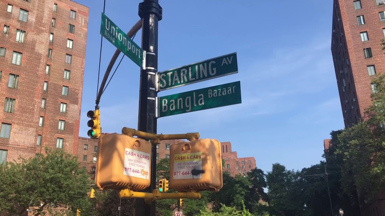Starling Avenue and Bangla Bazaar street signs at the intersection with Unionport Road in Parkchester, Bronx